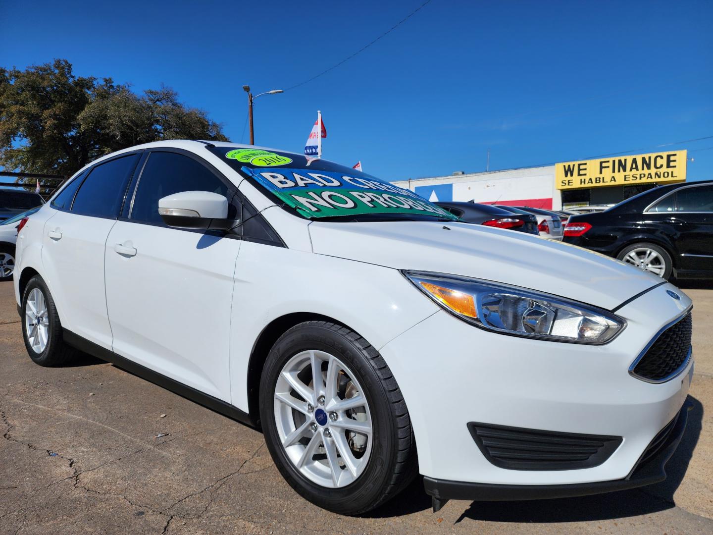 2016 WHITE Ford Focus SE (1FADP3F24GL) with an 2.0L L4 DOHC 16V engine, AUTO transmission, located at 2660 S.Garland Avenue, Garland, TX, 75041, (469) 298-3118, 32.885551, -96.655602 - Welcome to DallasAutos4Less, one of the Premier BUY HERE PAY HERE Dealers in the North Dallas Area. We specialize in financing to people with NO CREDIT or BAD CREDIT. We need proof of income, proof of residence, and a ID. Come buy your new car from us today!! This is a Super Clean 2016 FORD FOCUS - Photo#1